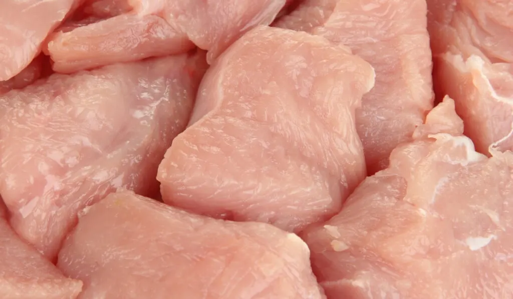 close up of raw sliced turkey meat