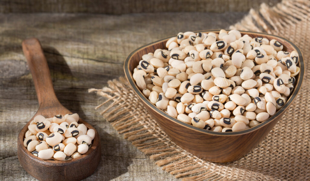 a spoon and bowl of Black-Eyed Peas