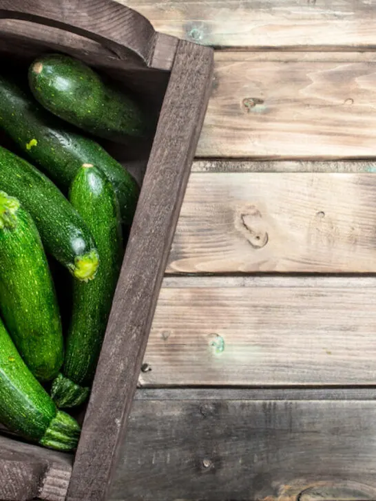 ripe zucchini in a wooden box