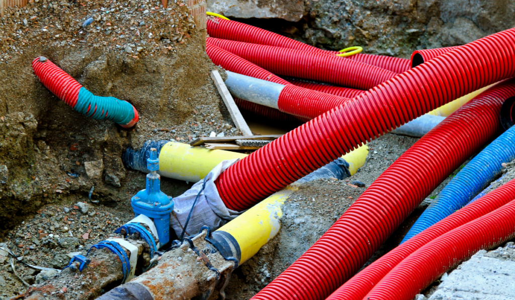 Underground construction of pipes hoses and cables
