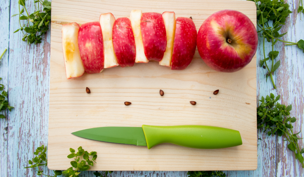  apple slices on wooden board