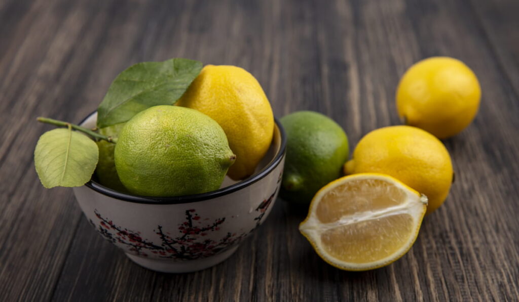 limes with lemons in a bowl