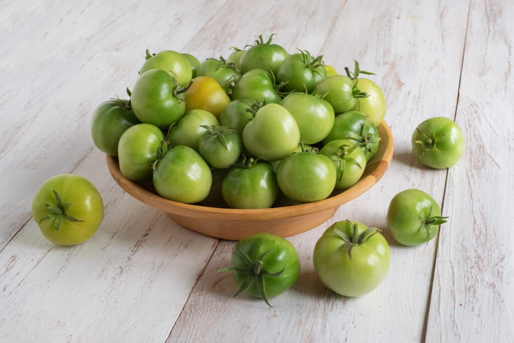 unripe tomatoes in a bowl