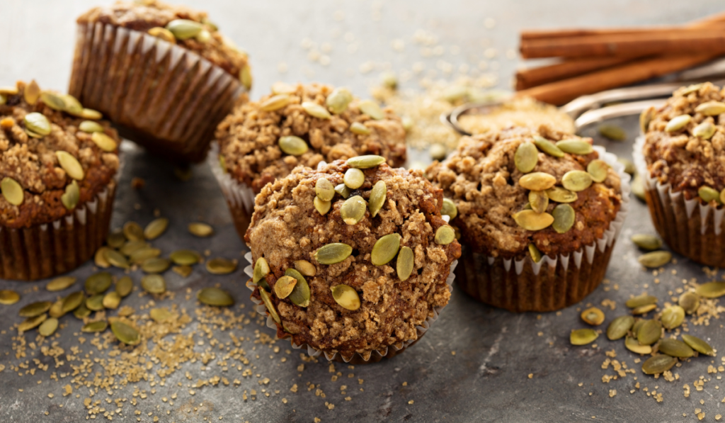 Healthy pumpkin muffins with fall spices and pumpkin seeds
