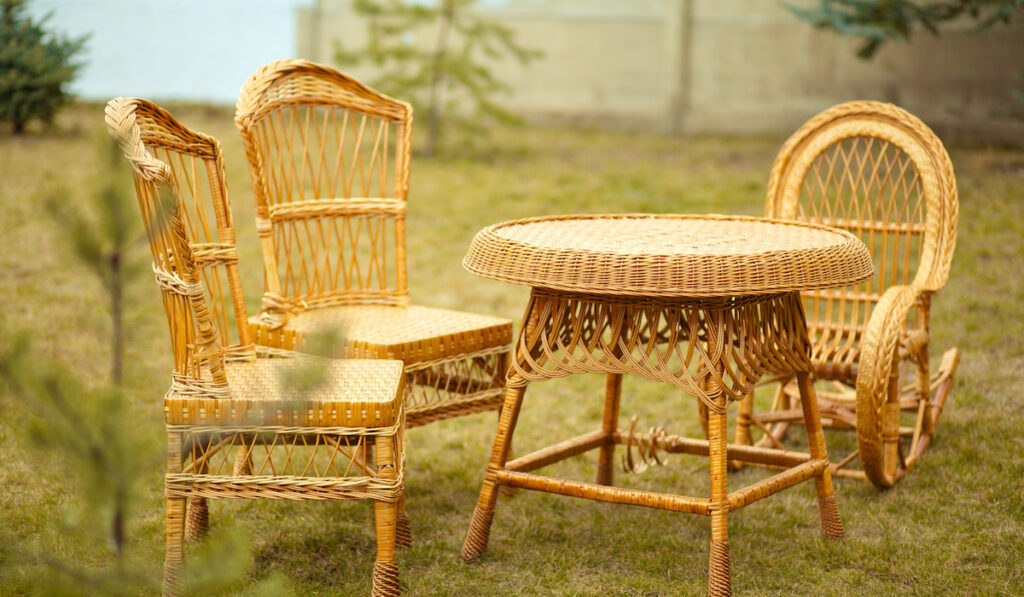 wicker furniture chair and table in the garden